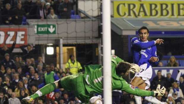 Goal ... Everton's Tim Cahill breaks the deadlock against lowly Carlisle.