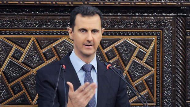 Syrian President Bashar Assad delivers a speech at the parliament in Damascus, Syria.