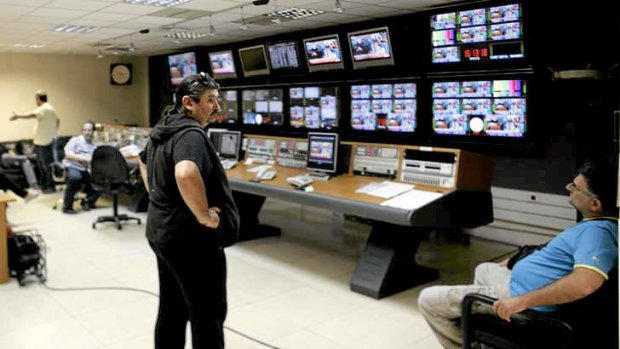 Workers occupy a production suite at the network's Athens headquarters. ERT journalists have refused to leave the premises following the shutdown order.