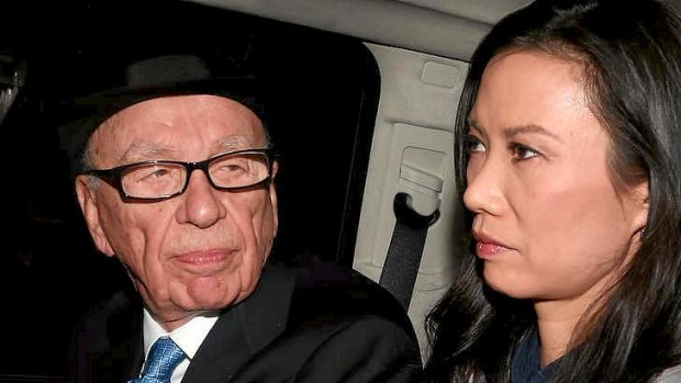 Rupert Murdoch looks to his wife, Wendi Deng Murdoch, as they are driven from The Leveson Inquiry in 2012.