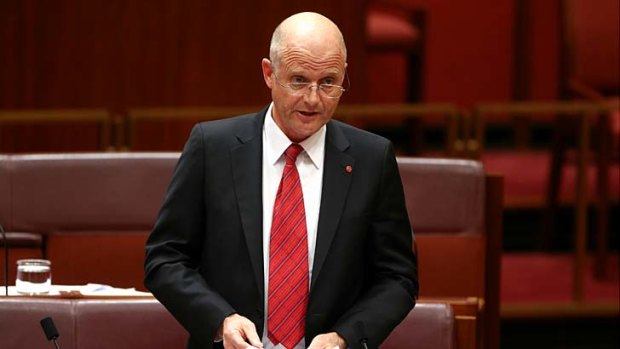 Senator David Leyonhjelm voted with Labor and the Greens to block government moves to scrap the tax cuts linked to the carbon tax.
