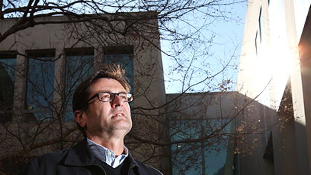 Outside Parliament House in Canberra Greg Combet ponders his first move as the incoming Climate Change Minister.