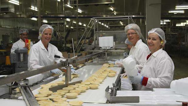 At Pattie Foods bakery in Bairnsdale it's a matter of "go pies" by the thousand to feed the grand final crowd.