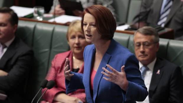 Fired up... Prime Minister Julia Gillard unloads on the opposition leader.