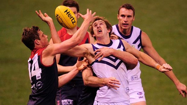 Up for grabs: Docker Michael Barlow contests a ball with Demon Rohan Bail.
