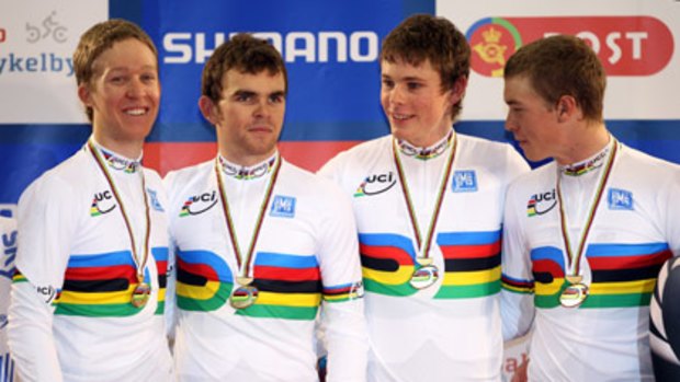 Australia's pursuit team of Cameron Meyer, Jack Bobridge, Michael Hepburn and Rohan Dennis pose with their medals after winning the Men's Team Pursuit at the Track Cycling World Championships.