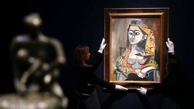 Pablo Picasso's <i>Femme au costume turc dans un fauteuil</i> ahead of the sale at Christie's London.