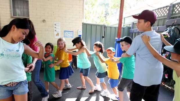 ''Let people know'' &#8230; children at North Parramatta Out of School Hours Care, where the co-ordinator says the government should explain the help available.