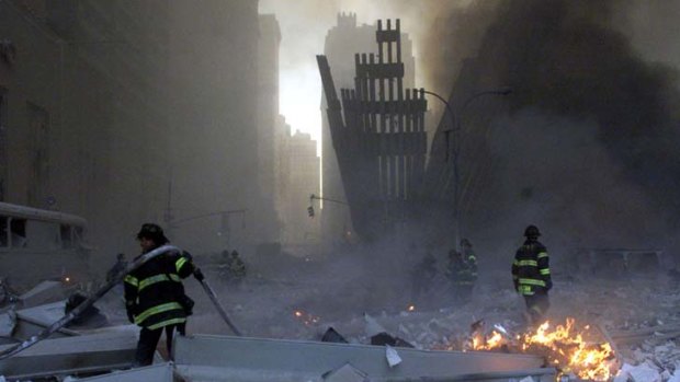 Painful memory ... firemen work around the World Trade Center after both towers collapsed in New York, September 11, 2001.