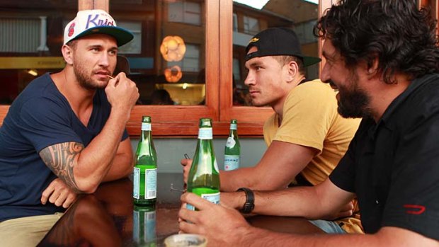 Mulling it over &#8230; Quade Cooper, with Sonny Bill Williams and manager Khoder Nasser in Randwick on Tuesday night.