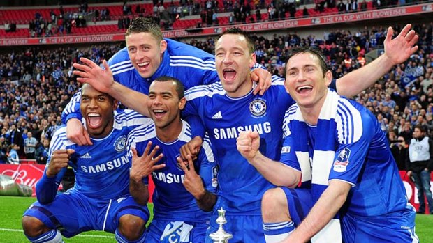 Daniel Sturridge, Gary Cahill, Ashley Cole, John Terry and Frank Lampard celebrate with the FA Cup in May. Cole and Lampard have been told they will be allowed to leave when their contracts expire.