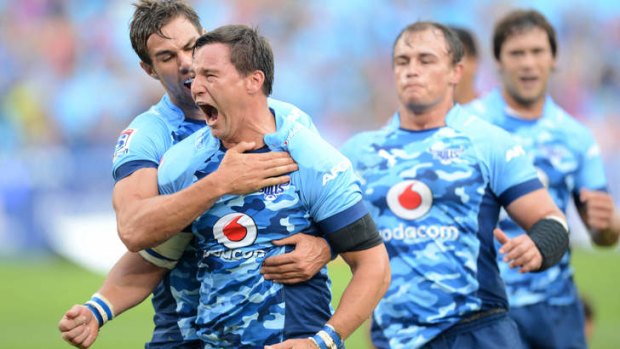 Points machine: Jacques-Louis Potgieter of the Bulls celebrates his try.