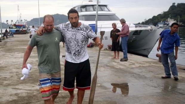 Australians tsunami survivors Daniel Scanlan and Robert Marino arrive in Padang.