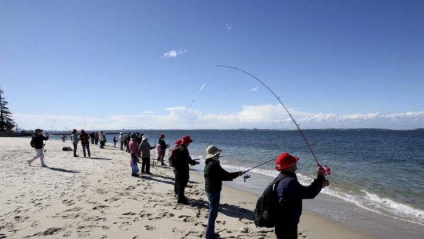 Catching tips ... fishers take part in the workshop in safe rock-fishing practices at Dolls Point.