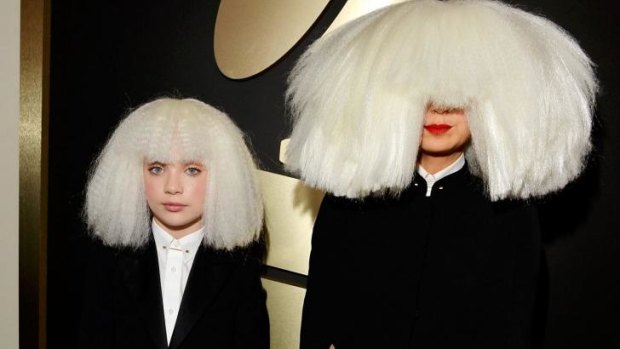 Sia (left) and dancer Maddie Ziegler attend the Grammy Awards.