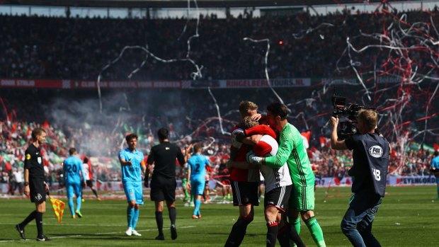 Brad Jones celebrates winning the title with Feyenoord.