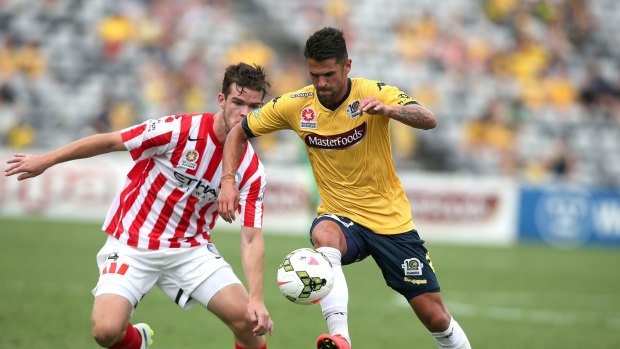 Fabio Ferreira of the Mariners contests the ball with Connor Chapman of Melbourne City during the round 20 A-League match between the Central Coast Mariners and Melbourne City FC at Central Coast Stadium on March 8, 2015 in Gosford, Australia