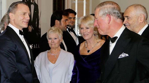 <em>Skyfall's</em> Daniel Craig and Judi Dench hobnob with royalty.