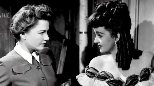Anne Baxter as Eve Harrington and Bette Davis as  Margo Channing.