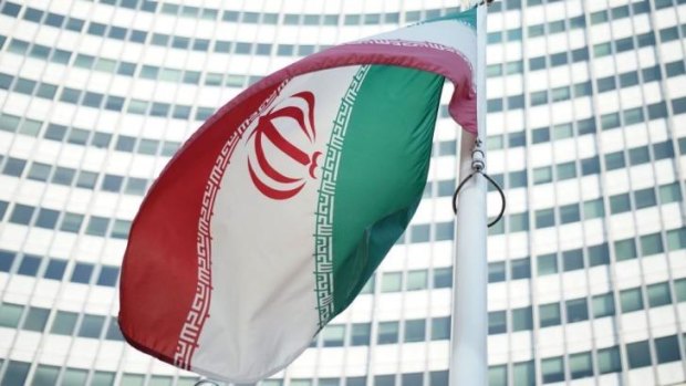 An Iranian flag outside the Vienna International Centre hosting the talks.