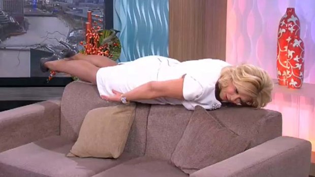 Kerri-Anne Kennerley performs some "planking" on her morning show.