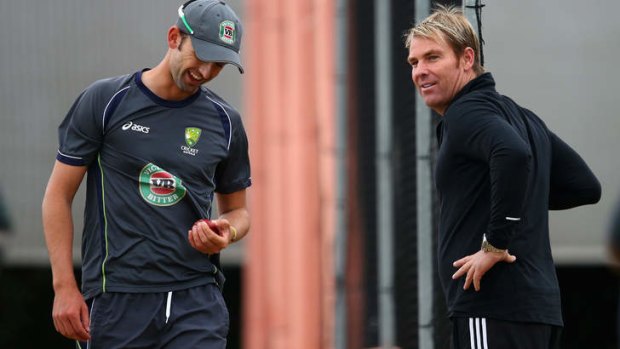 Shane Warne and Nathan Lyon during a nets session at Old Trafford in July.