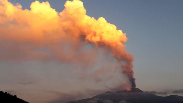 Smoke billows from Mount Etna volcano, as seen from the village of Viagrande, near the Sicilian town of Catania.