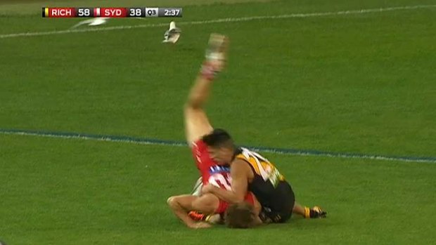 For review: Tiger Robin Nahas tackles Sydney's Nick Smith.