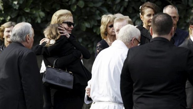 Family gathers to mourn: Nicole Kidman (far left) at her father's funeral.