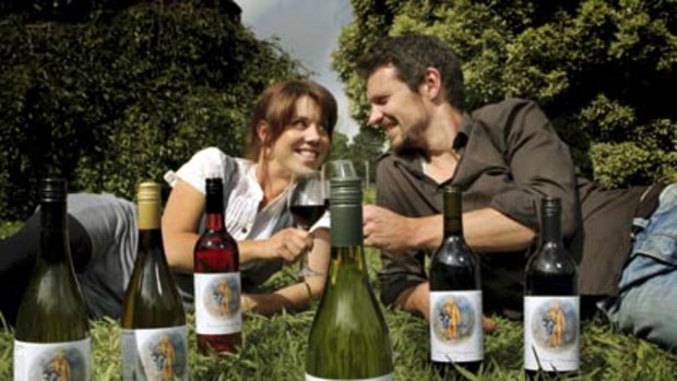 Bringing cheers: Alexandra Rees and David Laity with some of their charity-supporting wines.