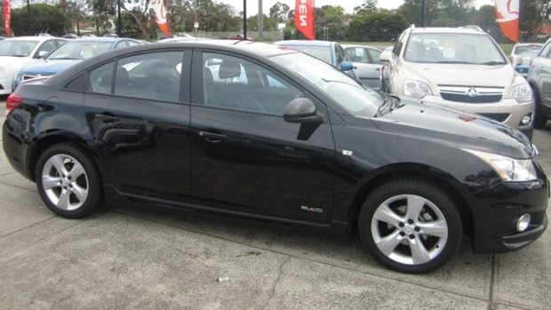 Police say the robber used a Holden Cruze, similar to this, as his getaway car.