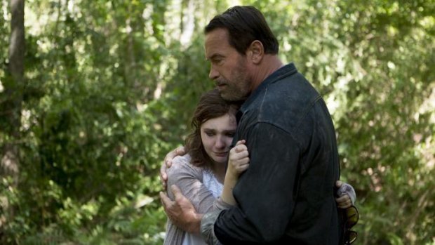 And again: Arnold Schwarzenegger with Abigail Breslin from <i>Maggie</i>.