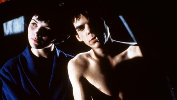 A young Juliette Binoche and the acrobatic Denis Lavant in <i>Bad Blood</i>.