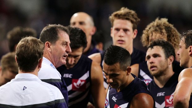 Ross Lyon addresses the players during the match against the Kangaroos.
