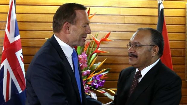 Prime Minister Tony Abbott and PNG Prime Minister Peter O'Neill at Parliament House in Port Moresby.
