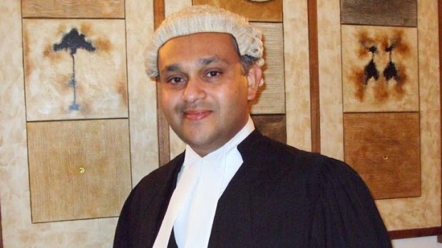 Australian lawyer Julian Moti likened his extradition to kidnap, which he claimed was based on his "physical complexion and political creed".