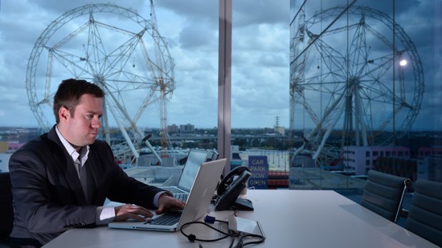 Big wheel: Nathaniel Carew at work in his Docklands office.