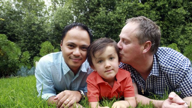 Jason and Adrian Tuazon-McCheyne and their four-year-old son, Ruben.