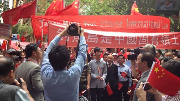 The scene outside the Japanese consulate in the CBD today.