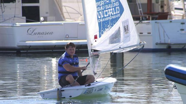 We're going to need a bigger boat ... Matt Dunning looks a little uncertain as he tests his sea legs to support Perth's sailing world championships in December. Interested Sydney to Hobart skippers can contact the Force for his details.
