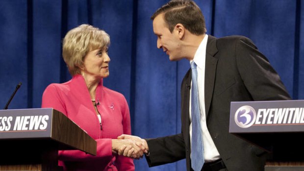Republican loser ... Linda McMahon, left, shakes hands with her Democratic opponent, Chris Murphy, in the Connecticut Senate race.