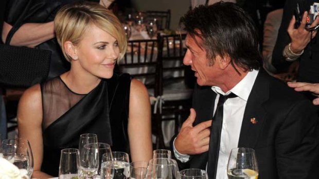 Charlize Theron and Sean Penn attend the Help Haiti Home Gala on January 11, 2014 in Beverly Hills, California.