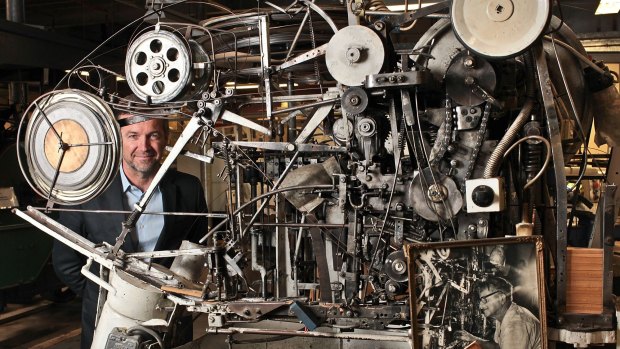 Peter Denham with Wes Standfield's mousetrap-making machine.
