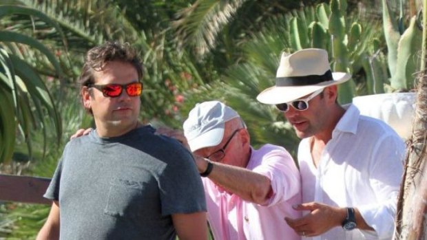 Easy does it: Lachlan, Rupert and James Murdoch in Greece.