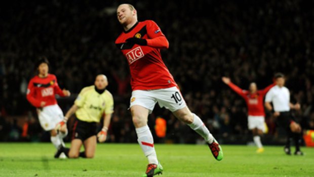 Wayne Rooney celebrates scoring his second goal just after half-time.