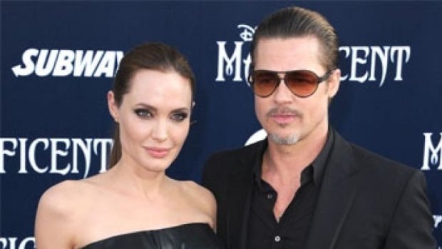 Angelina Jolie and Brad Pitt arrives at the World Premiere Of Disney's 'Maleficent' at the El Capitan Theatre.