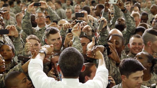 Barack Obama greets troops at Fort Campbell in Kentucky earlier this year.