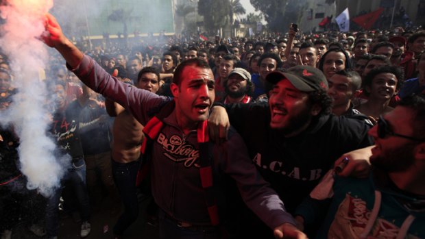 Egyptian soccer fans of Al-Ahly club celebrate a court verdict that returned 21 death penalties in last year's soccer violence.