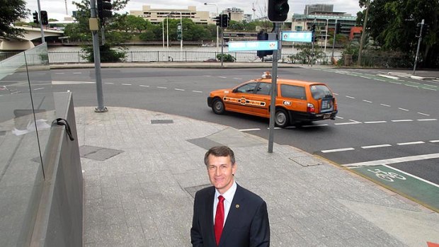 Lord Mayor Graham Quirk standing in front of the section of Adelaide Street which the proposed tunnel would go under.