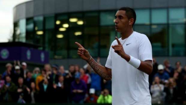 Nick Kyrgios of Australia celebrates after winning his Gentlemen's Singles third round match against Jiri Vesely of Czech Republic on day six of the Wimbledon Lawn Tennis Championships.